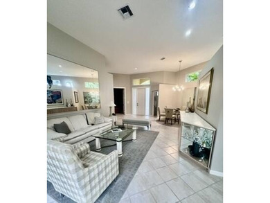 Welcome to this light-filled, impeccably maintained home in the on BallenIsles Golf and Country Club in Florida - for sale on GolfHomes.com, golf home, golf lot