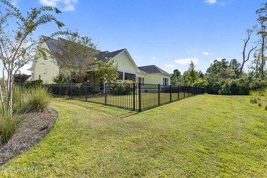 Welcome to this stunning 3-bedroom, 2.5-bathroom home in the on Cape Fear National At Brunswick Forest in North Carolina - for sale on GolfHomes.com, golf home, golf lot
