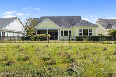 Welcome to this stunning 3-bedroom, 2.5-bathroom home in the on Cape Fear National At Brunswick Forest in North Carolina - for sale on GolfHomes.com, golf home, golf lot