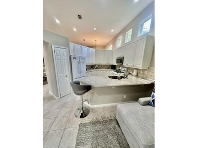 Welcome to this light-filled, impeccably maintained home in the on BallenIsles Golf and Country Club in Florida - for sale on GolfHomes.com, golf home, golf lot