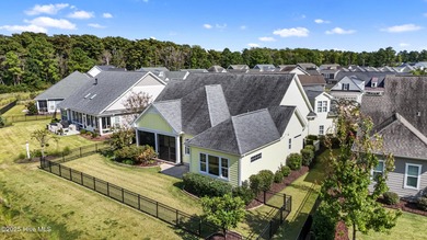 Welcome to this stunning 3-bedroom, 2.5-bathroom home in the on Cape Fear National At Brunswick Forest in North Carolina - for sale on GolfHomes.com, golf home, golf lot