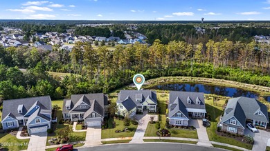 Welcome to this stunning 3-bedroom, 2.5-bathroom home in the on Cape Fear National At Brunswick Forest in North Carolina - for sale on GolfHomes.com, golf home, golf lot