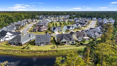 Welcome to this stunning 3-bedroom, 2.5-bathroom home in the on Cape Fear National At Brunswick Forest in North Carolina - for sale on GolfHomes.com, golf home, golf lot