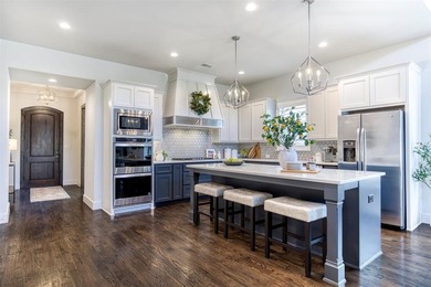 2313 Hyer Place, located in Melton Ridge, was built by Shaddock on WestRidge Golf Course in Texas - for sale on GolfHomes.com, golf home, golf lot