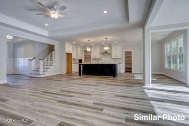 The Otter by American Homesmith offers easy, coastal living in on Lennon Hills Golf Course in North Carolina - for sale on GolfHomes.com, golf home, golf lot