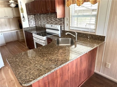 This turnkey two-bedroom, two-bath home is situated on an on Bonita Fairways in Florida - for sale on GolfHomes.com, golf home, golf lot