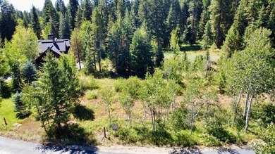 Picturesque .81-acre estate homesite with centralized access to on Osprey Meadows at Tamarack Resort in Idaho - for sale on GolfHomes.com, golf home, golf lot