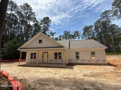 Now available and nearing completion, the 'Lindie' single level on Foxfire Golf and Country Club in North Carolina - for sale on GolfHomes.com, golf home, golf lot