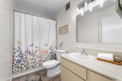 Tastefully updated, this move-in ready fee simple 1BR/1BA unit on Ala Wai Golf Course in Hawaii - for sale on GolfHomes.com, golf home, golf lot