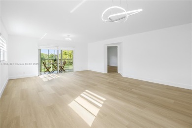 Stunning Fully Remodeled Corner Unit. Spacious & Elegant! on Flamingo Lakes Country Club in Florida - for sale on GolfHomes.com, golf home, golf lot