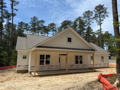 Now available and nearing completion, the 'Lindie' single level on Foxfire Golf and Country Club in North Carolina - for sale on GolfHomes.com, golf home, golf lot