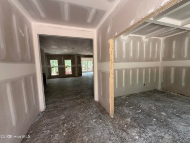 Now available and nearing completion, the 'Lindie' single level on Foxfire Golf and Country Club in North Carolina - for sale on GolfHomes.com, golf home, golf lot
