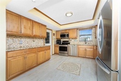 Start your morning with a cup of coffee and end it on the green on Rotonda Golf and Country Club The Hills Course in Florida - for sale on GolfHomes.com, golf home, golf lot