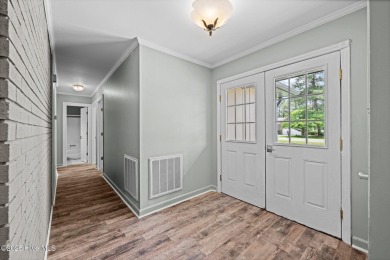 Welcome home to 1403 Santa Lucia rd in the sought after commnity on Harbour Point Golf Club in North Carolina - for sale on GolfHomes.com, golf home, golf lot