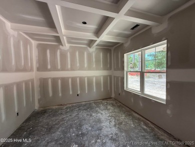 Now available and nearing completion, the 'Lindie' single level on Foxfire Golf and Country Club in North Carolina - for sale on GolfHomes.com, golf home, golf lot