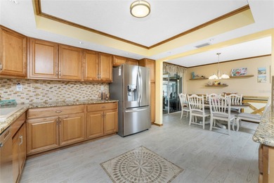 Start your morning with a cup of coffee and end it on the green on Rotonda Golf and Country Club The Hills Course in Florida - for sale on GolfHomes.com, golf home, golf lot