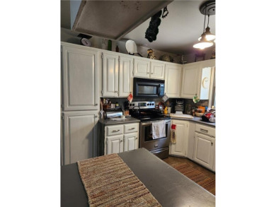 Love mountain biking, golfing, swimming? Less than one mile to on Bella Vista Country Club - Berksdale in Arkansas - for sale on GolfHomes.com, golf home, golf lot