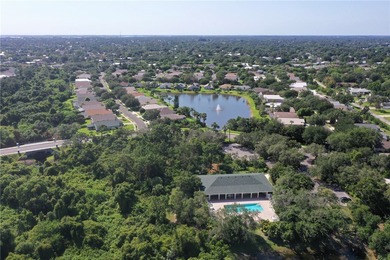 Experience elevated coastal living at Pelican Pointe, an on Pelican Pointe 9 Hole Course in Florida - for sale on GolfHomes.com, golf home, golf lot