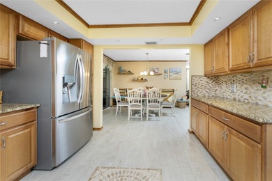 Start your morning with a cup of coffee and end it on the green on Rotonda Golf and Country Club The Hills Course in Florida - for sale on GolfHomes.com, golf home, golf lot