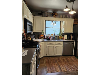 Love mountain biking, golfing, swimming? Less than one mile to on Bella Vista Country Club - Berksdale in Arkansas - for sale on GolfHomes.com, golf home, golf lot