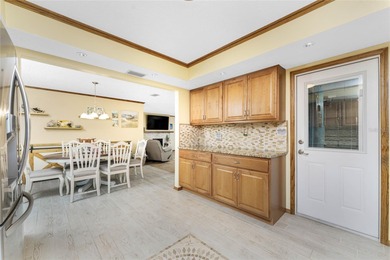 Start your morning with a cup of coffee and end it on the green on Rotonda Golf and Country Club The Hills Course in Florida - for sale on GolfHomes.com, golf home, golf lot