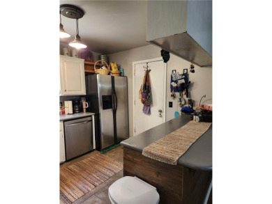 Love mountain biking, golfing, swimming? Less than one mile to on Bella Vista Country Club - Berksdale in Arkansas - for sale on GolfHomes.com, golf home, golf lot