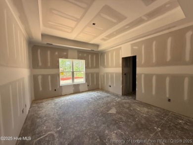Now available and nearing completion, the 'Lindie' single level on Foxfire Golf and Country Club in North Carolina - for sale on GolfHomes.com, golf home, golf lot