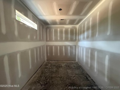 Now available and nearing completion, the 'Lindie' single level on Foxfire Golf and Country Club in North Carolina - for sale on GolfHomes.com, golf home, golf lot