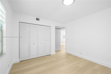 Stunning Fully Remodeled Corner Unit. Spacious & Elegant! on Flamingo Lakes Country Club in Florida - for sale on GolfHomes.com, golf home, golf lot