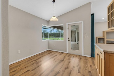 One or more photo(s) has been virtually staged. NEW FLOORING In on Deep Creek Golf Club in Florida - for sale on GolfHomes.com, golf home, golf lot