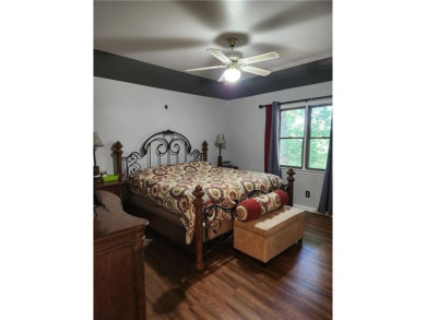 Love mountain biking, golfing, swimming? Less than one mile to on Bella Vista Country Club - Berksdale in Arkansas - for sale on GolfHomes.com, golf home, golf lot