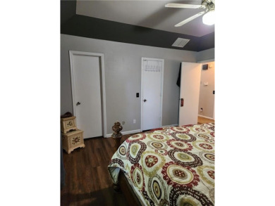 Love mountain biking, golfing, swimming? Less than one mile to on Bella Vista Country Club - Berksdale in Arkansas - for sale on GolfHomes.com, golf home, golf lot