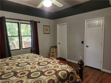 Love mountain biking, golfing, swimming? Less than one mile to on Bella Vista Country Club - Berksdale in Arkansas - for sale on GolfHomes.com, golf home, golf lot