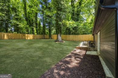 Stunning Mid-Century Modern Gem in Adams Park! Welcome to this on Alfred Tup Holmes Golf Course in Georgia - for sale on GolfHomes.com, golf home, golf lot