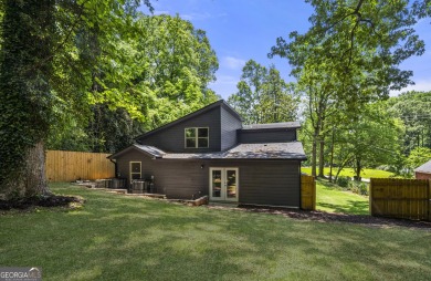 Stunning Mid-Century Modern Gem in Adams Park! Welcome to this on Alfred Tup Holmes Golf Course in Georgia - for sale on GolfHomes.com, golf home, golf lot