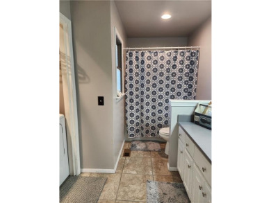 Love mountain biking, golfing, swimming? Less than one mile to on Bella Vista Country Club - Berksdale in Arkansas - for sale on GolfHomes.com, golf home, golf lot