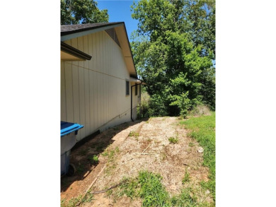 Love mountain biking, golfing, swimming? Less than one mile to on Bella Vista Country Club - Berksdale in Arkansas - for sale on GolfHomes.com, golf home, golf lot