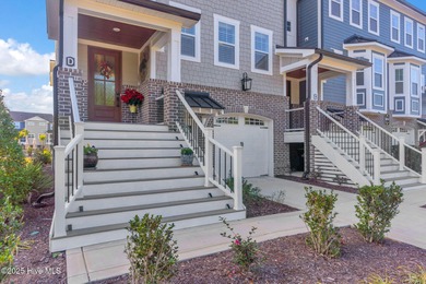 Coastal luxury meets low-maintenance living in this beautifully on Sea Trail Golf Resort in North Carolina - for sale on GolfHomes.com, golf home, golf lot