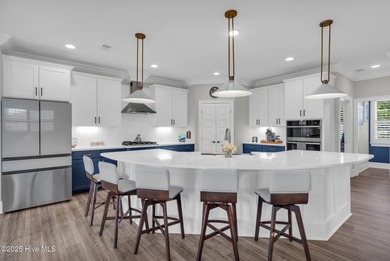 Coastal luxury meets low-maintenance living in this beautifully on Sea Trail Golf Resort in North Carolina - for sale on GolfHomes.com, golf home, golf lot