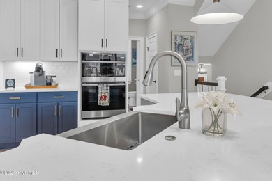 Coastal luxury meets low-maintenance living in this beautifully on Sea Trail Golf Resort in North Carolina - for sale on GolfHomes.com, golf home, golf lot