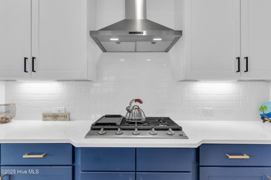 Coastal luxury meets low-maintenance living in this beautifully on Sea Trail Golf Resort in North Carolina - for sale on GolfHomes.com, golf home, golf lot