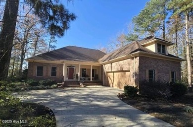 Coastal magnificence! This gorgeous brick home on nearly one on Sound Golf Links at Albemarle Plantation in North Carolina - for sale on GolfHomes.com, golf home, golf lot