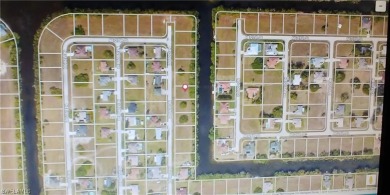 Fantastic canal front lot for building your dream home or to on Del Tura Golf and Country Club in Florida - for sale on GolfHomes.com, golf home, golf lot