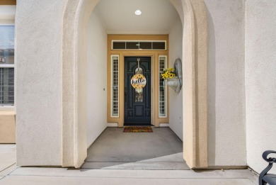 Perched on an elevated 7,841 sq. ft. lot overlooking the 9th on Golf Club At La Quinta in California - for sale on GolfHomes.com, golf home, golf lot