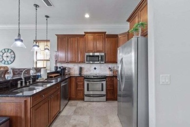 Discover the exquisite Mediterranean-style residence in the on Sandestin Golf and Beach Resort - Raven in Florida - for sale on GolfHomes.com, golf home, golf lot