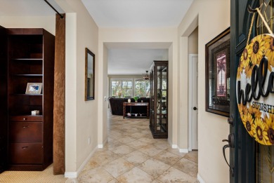 Perched on an elevated 7,841 sq. ft. lot overlooking the 9th on Golf Club At La Quinta in California - for sale on GolfHomes.com, golf home, golf lot