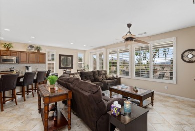 Perched on an elevated 7,841 sq. ft. lot overlooking the 9th on Golf Club At La Quinta in California - for sale on GolfHomes.com, golf home, golf lot