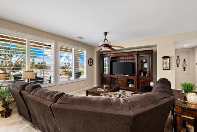 Perched on an elevated 7,841 sq. ft. lot overlooking the 9th on Golf Club At La Quinta in California - for sale on GolfHomes.com, golf home, golf lot