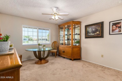 Enjoy the best of active adult living in this charming 3-bedroom on Sun City Country Club in Arizona - for sale on GolfHomes.com, golf home, golf lot