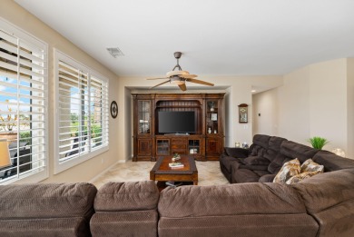 Perched on an elevated 7,841 sq. ft. lot overlooking the 9th on Golf Club At La Quinta in California - for sale on GolfHomes.com, golf home, golf lot
